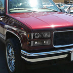 1994-1999 GMC C/K C10 Sierra Dual Halo Projector Headlights With Bumper and Corner Signal Lights (Matte Black Housing/Clear Lens)