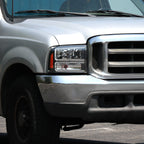 1999-2004 Ford F-250/F-350/F-450/F-550/2000-2004 Excursion Euro Factory Style Headlights with Dual LED C-Bar  (Matte Black Housing/Clear Lens)