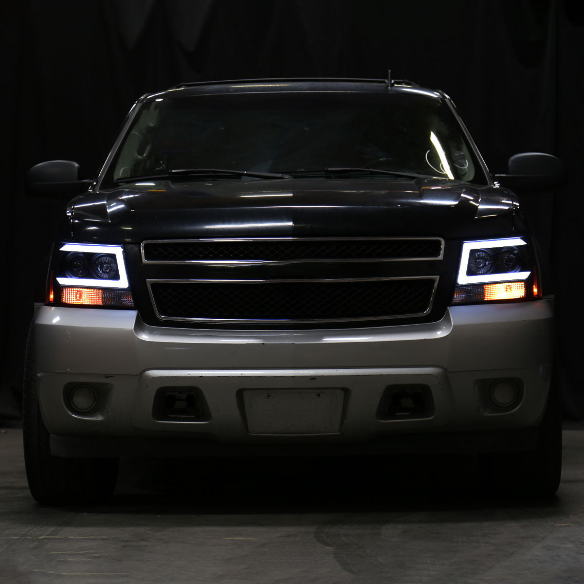 2007-2013 Chevrolet Avalanche/ 2007-2014 Tahoe Suburban LED C-Bar Projector Headlights (Black Housing/Smoked Lens)