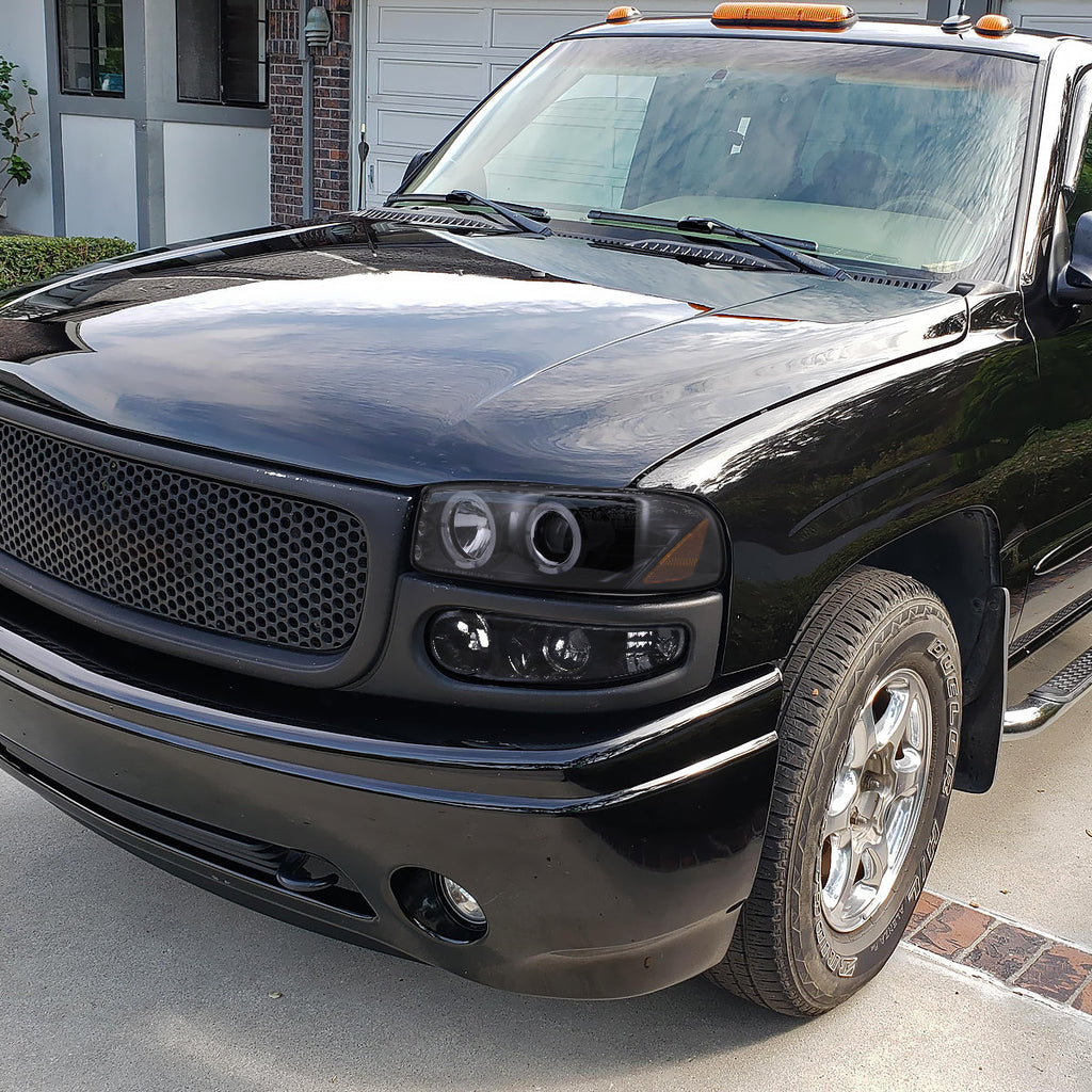 1999-2006 GMC Sierra/ 2000-2006 Yukon/Yukon XL Dual Halo Projector Headlights with LED Sequential Turn Signal Bumper Lights (Glossy Black Housing/Smoked Lens)