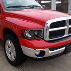 2002-2005 Dodge RAM 1500/ 2003-2005 RAM 2500 3500 Projector Headlights w/ Amber Reflectors (Matte Black Housing/Clear Lens)