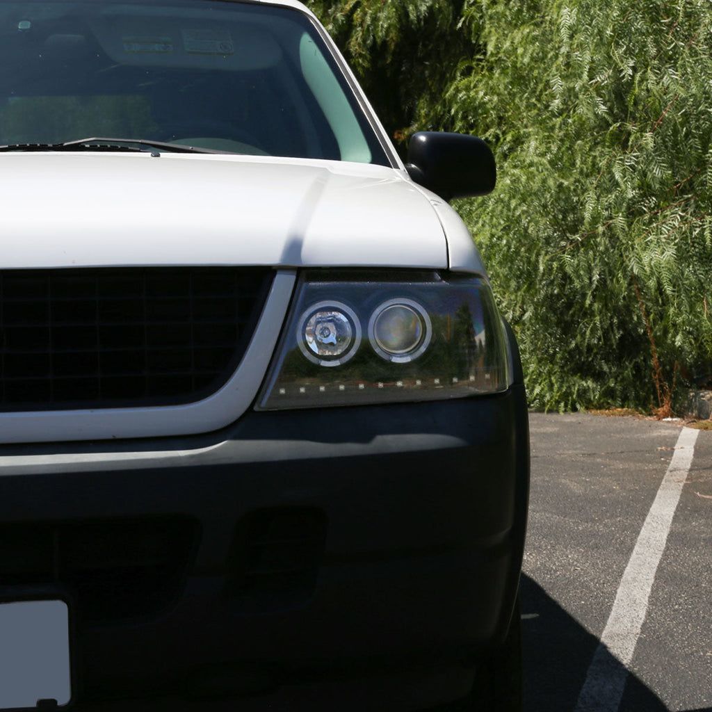 2002-2005 Ford Explorer Dual Halo Projector Headlights w/ LED Light Strip (Jet Black Housing/Clear Lens)