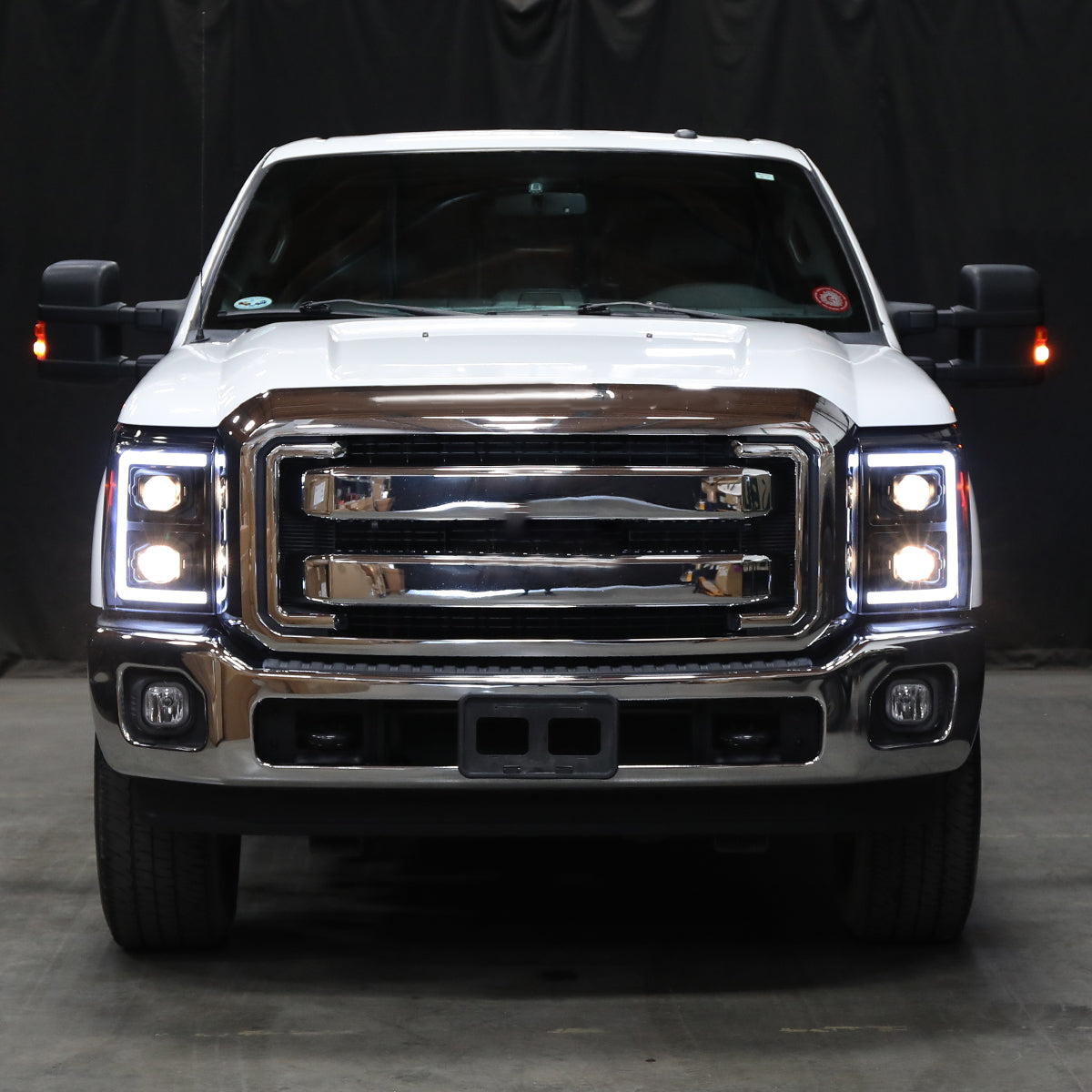 2017-2019 Ford F-250 F-350 F-450 F-550 LED C-Bar Projector Headlights w/ Switchback Sequential Turn Signals (Glossy Black Housing/Smoked Lens)