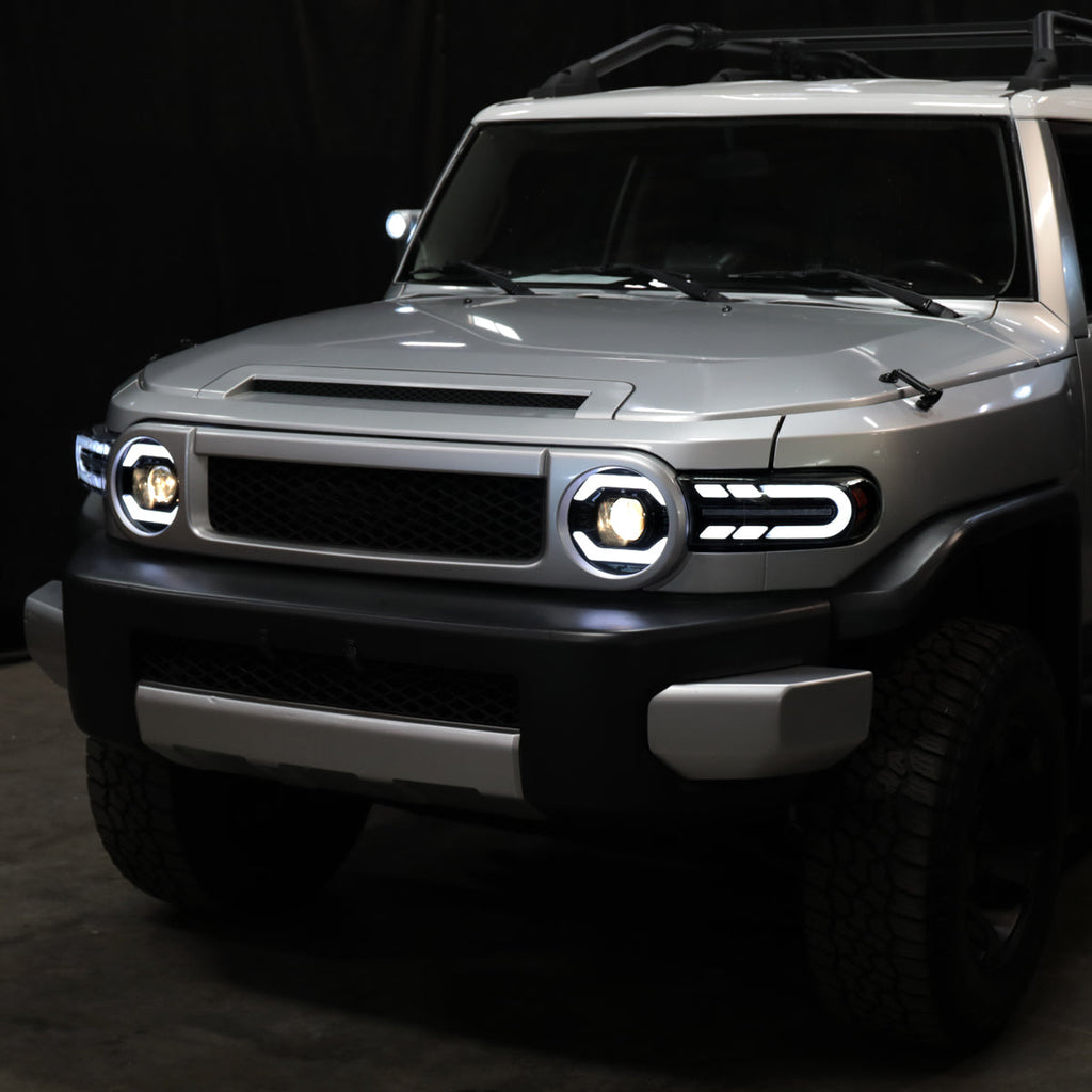 2007-2014 Toyota FJ Cruiser Switchback Sequential Turn Signal Animated LED Bar Projector Headlights (Matte Black Housing/Smoked Lens)