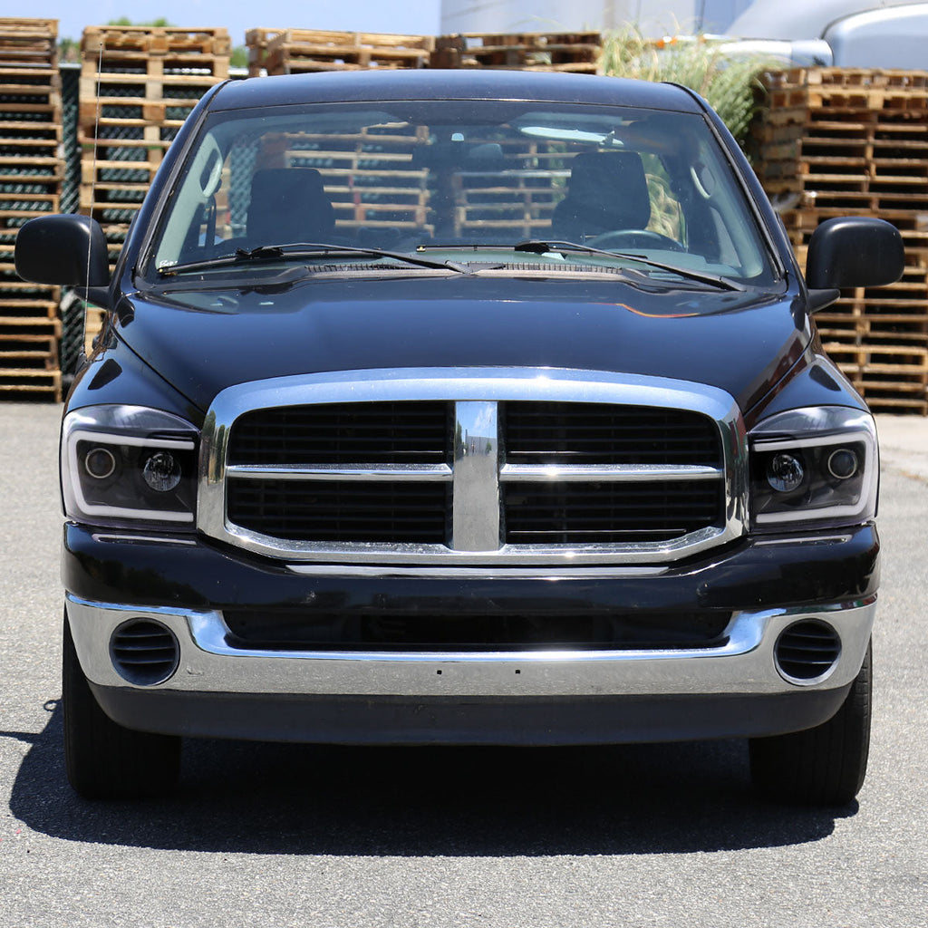 2006-2008 Dodge RAM 1500/ 2006-2009 2500 3500 Switchback LED C-Bar Projector Headlights (Jet Black Housing/Clear Lens)