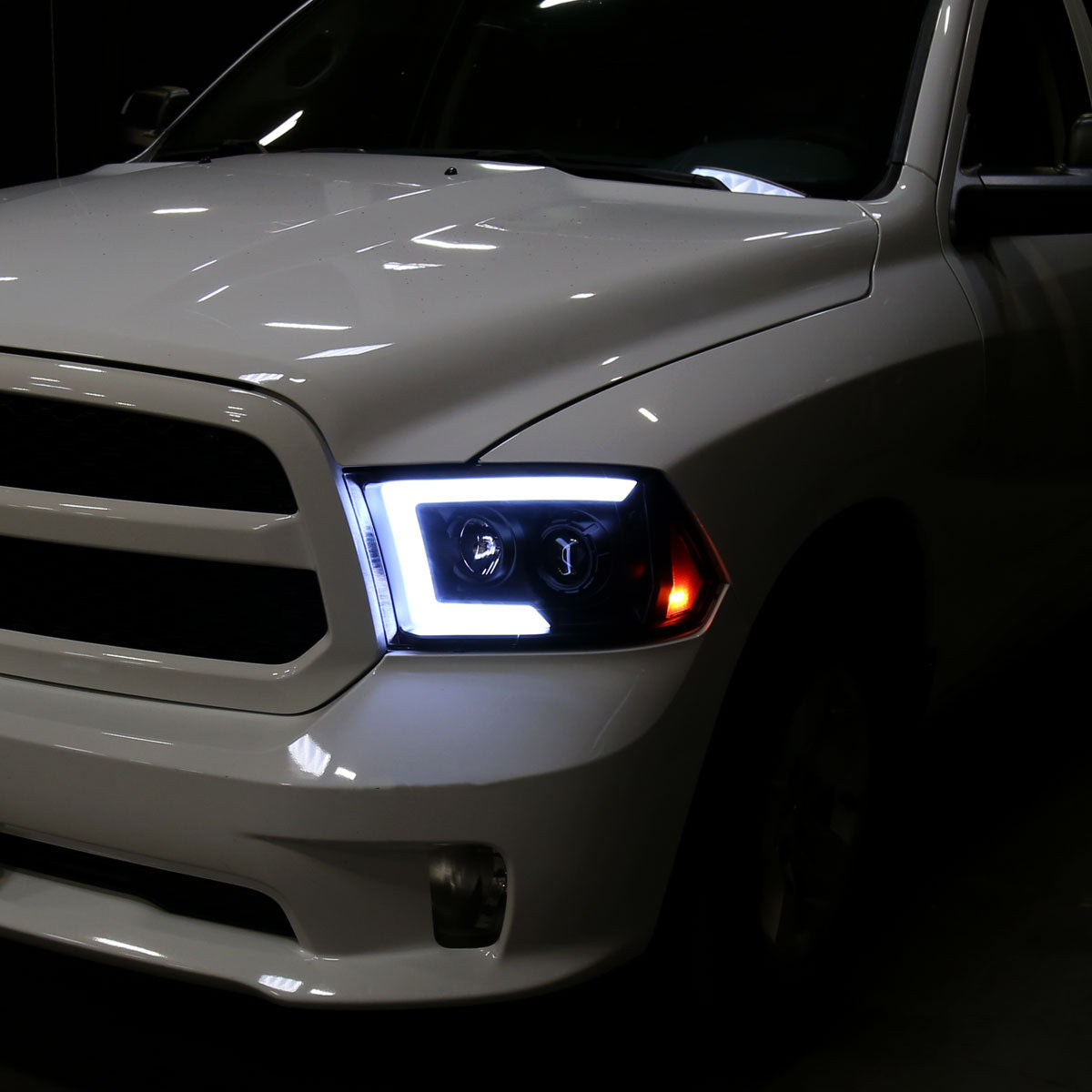 2009-2018 Dodge RAM 1500 / 2019-2021 RAM Classic/ 2010-2018 RAM 2500 3500 Switchback Sequential LED C-Bar Projector Headlights (Matte Black Housing/Clear Lens)