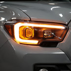 2016-2023 Toyota Tacoma Switchback LED C-Bar Projector Headlights (Matte Black Housing/Clear Lens)