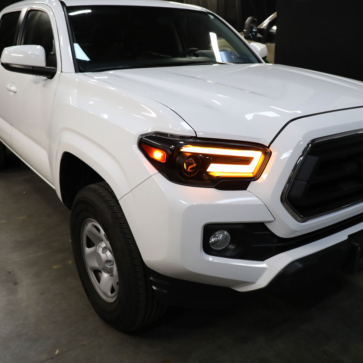 2016-2023 Toyota Tacoma Switchback Sequential LED Bar Projector Headlights (Black Housing/Smoked Lens)
