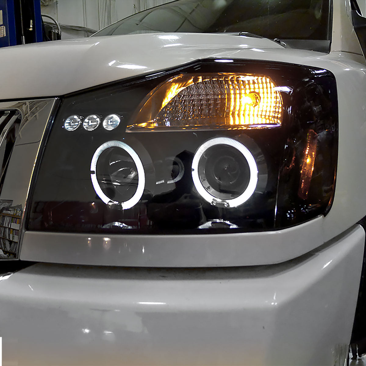 2004-2015 Nissan Titan/ 2004-2007 Armada Dual Halo Projector Headlights (Glossy Black Housing/Smoked Lens)