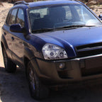 2005-2009 Hyundai Tucson Single Halo Projector Headlights (Chrome Housing/Clear Lens)