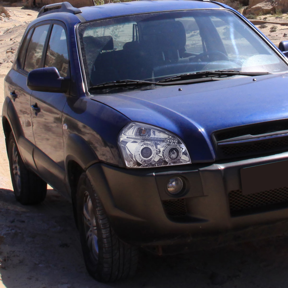 2005-2009 Hyundai Tucson Single Halo Projector Headlights (Chrome Housing/Clear Lens)