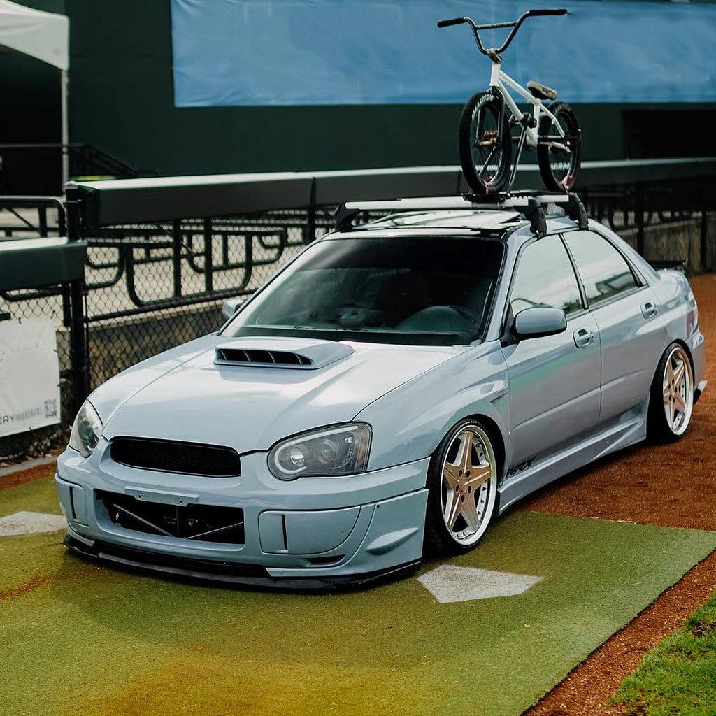 2004-2005 Subaru Impreza WRX/STI Outback Projector Headlights w/ LED Light Bar (Glossy Black Housing/Clear Lens)