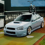 2004-2005 Subaru Impreza WRX/STI Outback Projector Headlights w/ LED Light Bar (Glossy Black Housing/Clear Lens)
