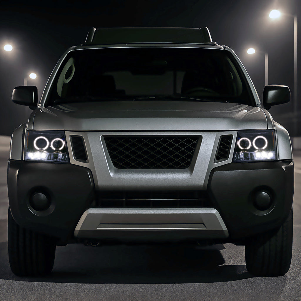 2005-2015 Nissan Xterra Dual Halo Projector Headlights (Glossy Black Housing/Smoked Lens)