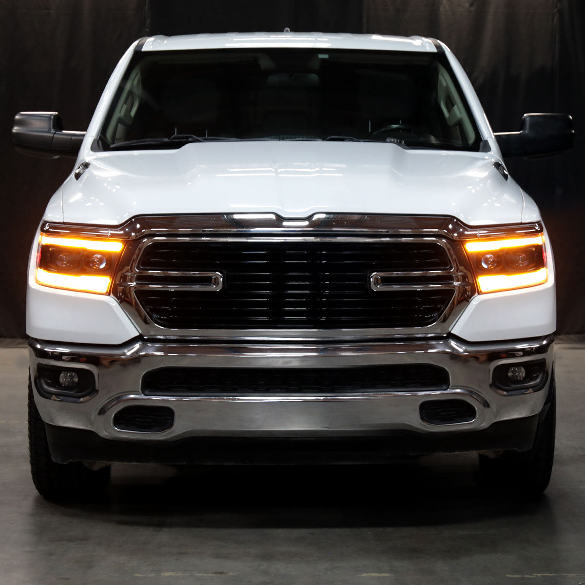 2019??‚??2024 Dodge RAM 1500 Projector Headlights w/ Amber LED Sequential Turn Signals & Startup Animation (Matte Black Housing / Clear Lens)