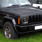 1997-2001 Jeep Cherokee Halo Projector Headlights w/ SMD LED Light Strip (Matte Black Housing/Clear Lens)