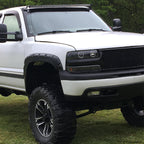 1999-2002 Chevrolet Silverado/ 2000-2006 Tahoe Suburban Dual Halo Projector Headlights (Matte Black Housing/Clear Lens)