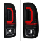 1999-2007 Ford F-250 / F-350 / F-450 / F-550 Super Duty Red LED C-Bar Tail Lights (Black Housing / Clear Lens)