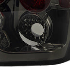 2005-2006 Jeep Grand Cherokee Tail Lights (Chrome Housing/Smoked Lens)