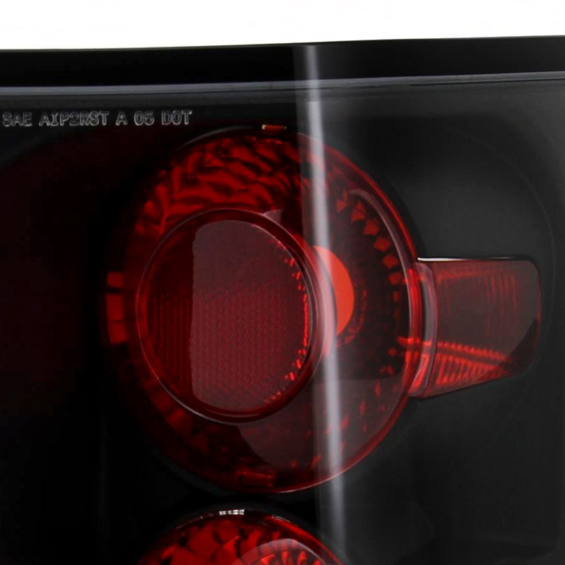 2005-2006 Jeep Grand Cherokee Tail Lights (Matte Black Housing/Clear Lens)