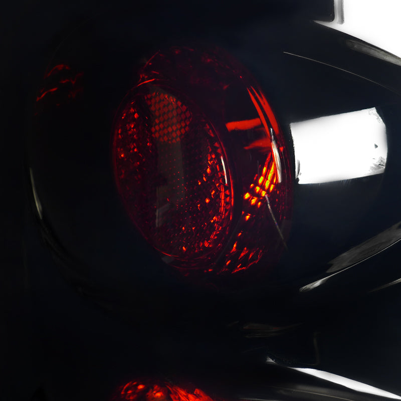2002-2006 Dodge RAM Tail Lights (Glossy Black Housing/Smoked Lens)
