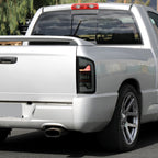 2002-2006 Dodge RAM 1500/2500/3500 White LED Bar Tail Lights (Matte Black Housing/Smoked Lens)