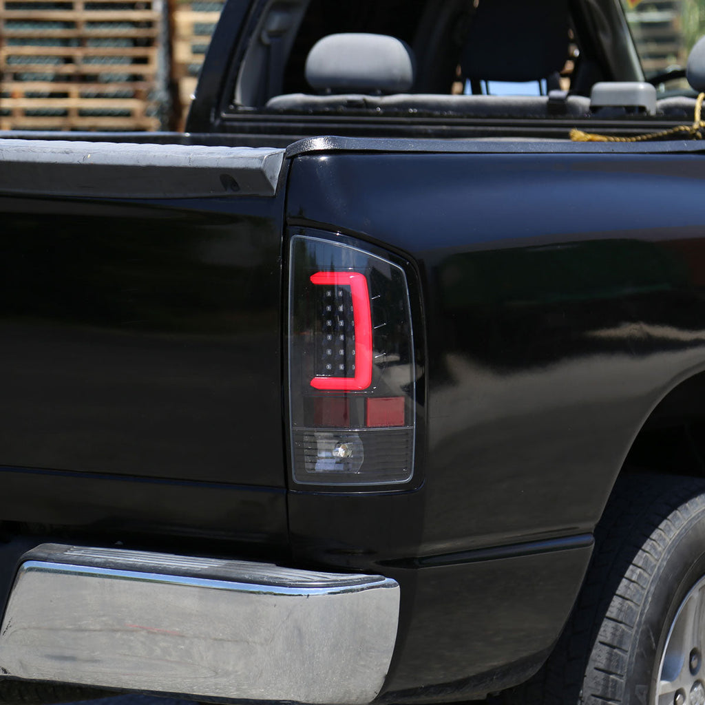 2007-2009 Dodge RAM 1500/2500/3500 Red C-Bar LED Tail Lights (Jet Black Housing/Clear Lens)