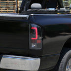 2007-2009 Dodge RAM 1500/2500/3500 Red C-Bar LED Tail Lights (Jet Black Housing/Clear Lens)
