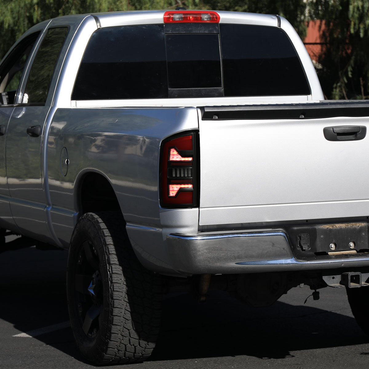 2007-2009 Dodge RAM 1500/2500/3500 Red LED Bar Tail Lights (Matte Black Housing/Smoked Lens)