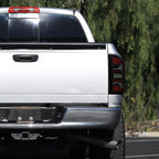 2007-2009 Dodge RAM 1500/2500/3500 Red LED Bar Tail Lights (Matte Black Housing/Smoked Lens)