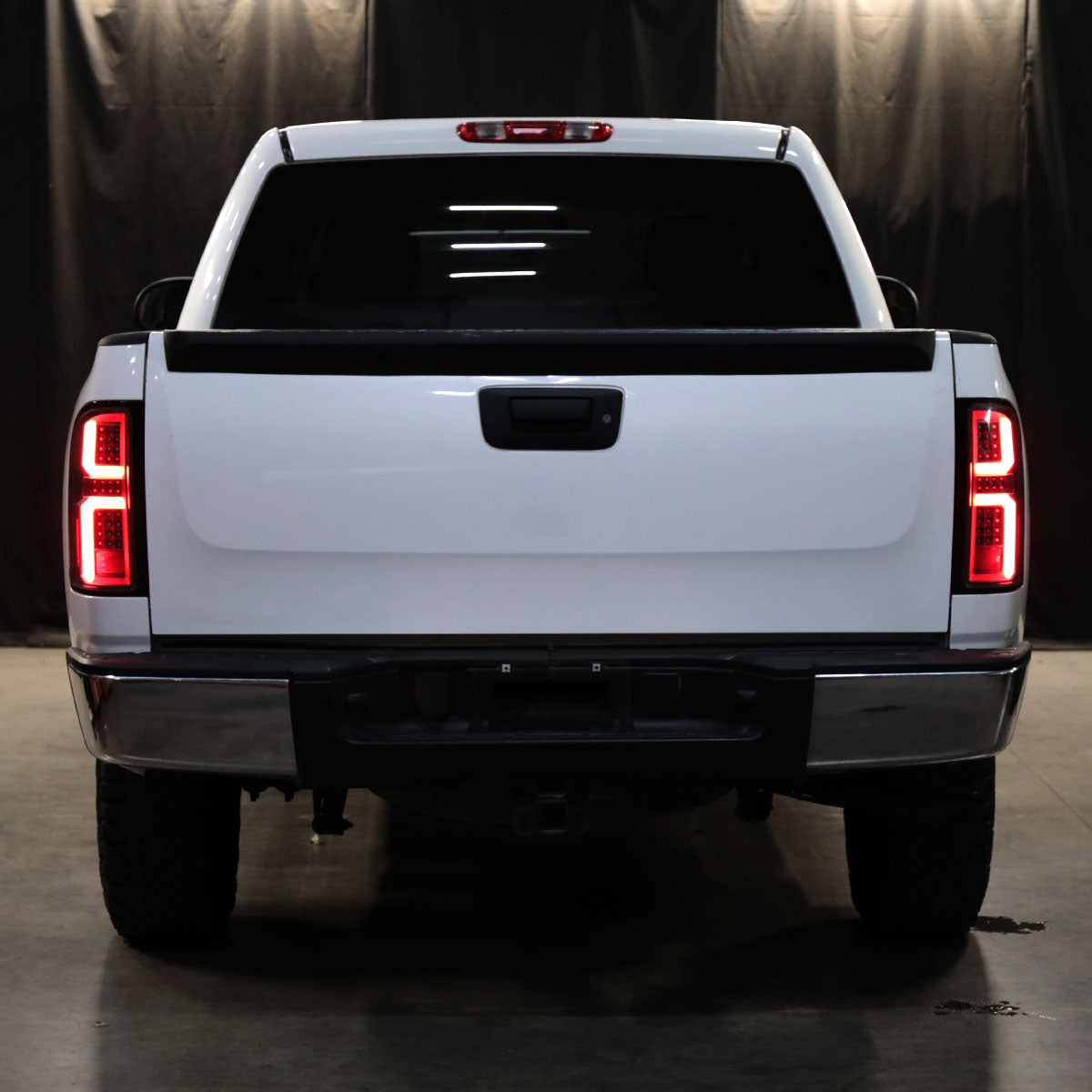 2007-2013 Chevrolet Silverado 1500/ 2007-2014 Silverado 2500HD/3500HD LED Tail Lights with Red LED Bar (Black Housing/Clear Lens)